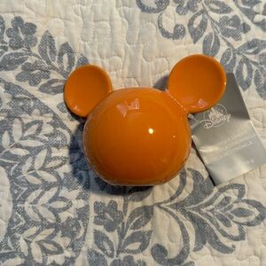 NWT. Disney Parks Mickey Mouse Icon Orange Citronella Ceramic Candle